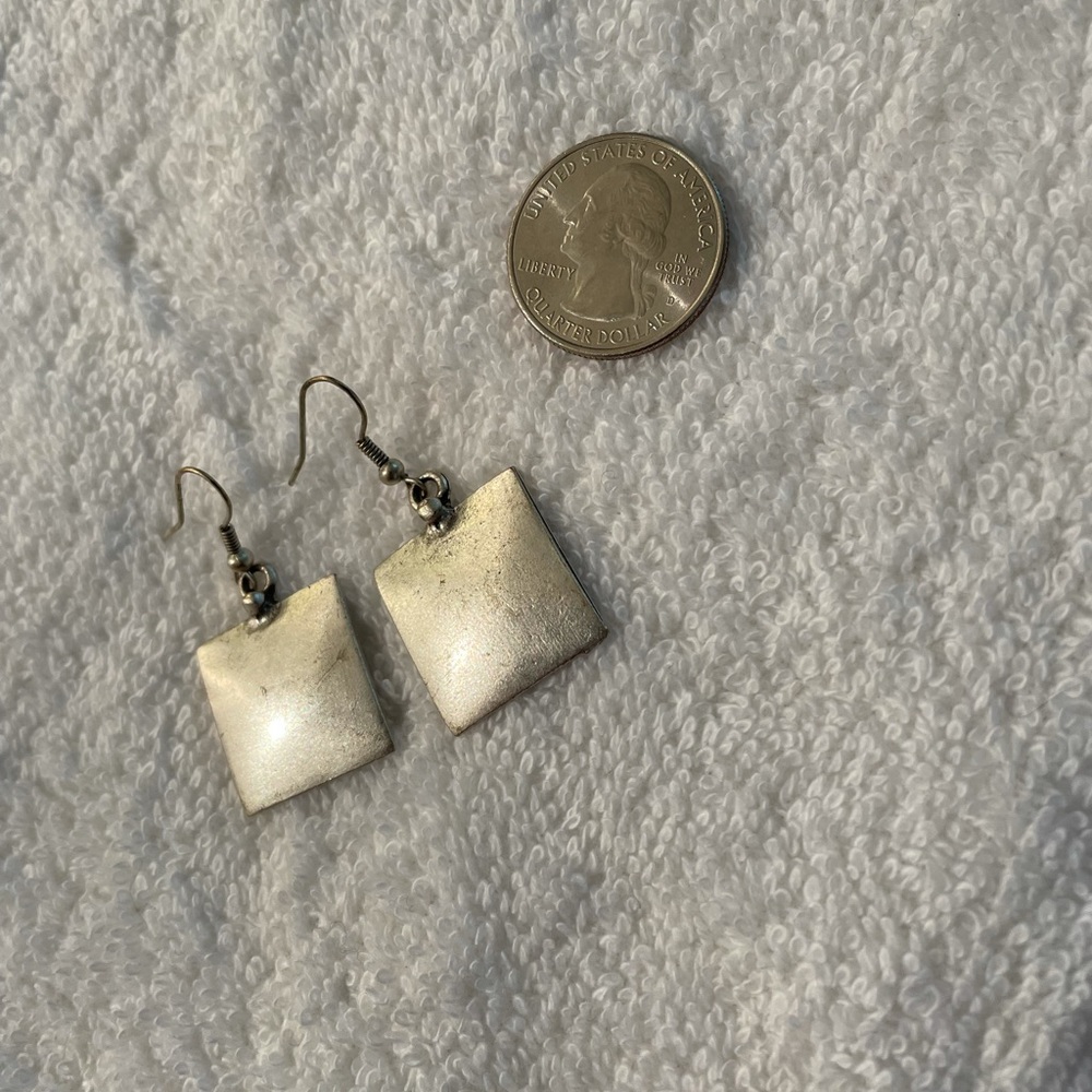 Silver tone earrings